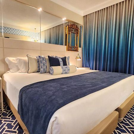 Golden Lis Hotel Boutique Гояния Екстериор снимка A bedroom at the hotel