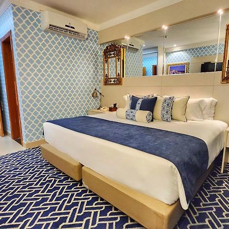 Golden Lis Hotel Boutique Гояния Екстериор снимка A bedroom at the hotel
