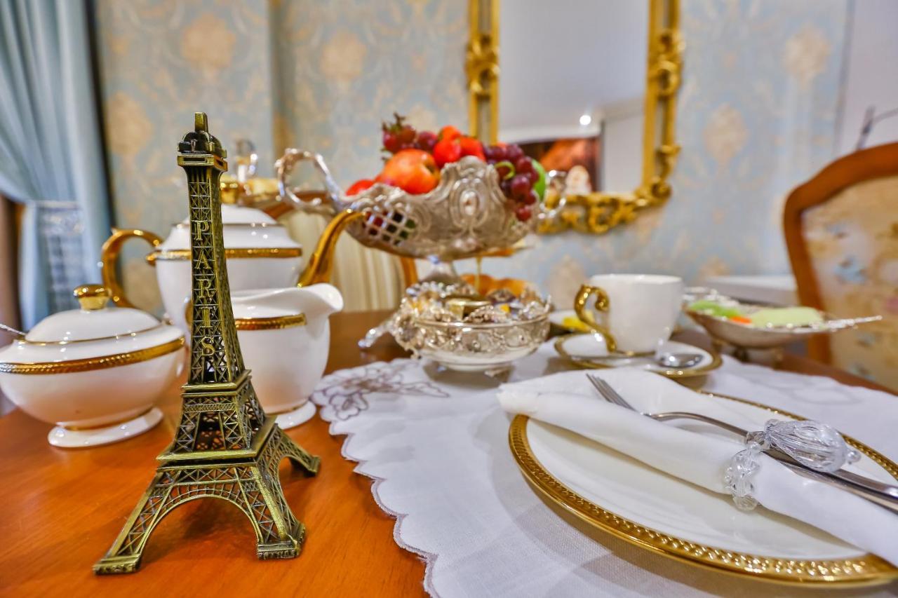 Golden Lis Hotel Boutique Гояния Екстериор снимка A table set for afternoon tea